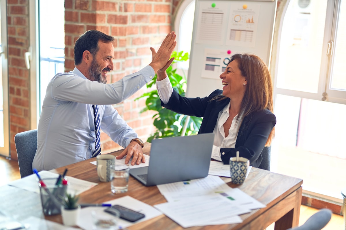 APAX team members collaborating in the Lexington office